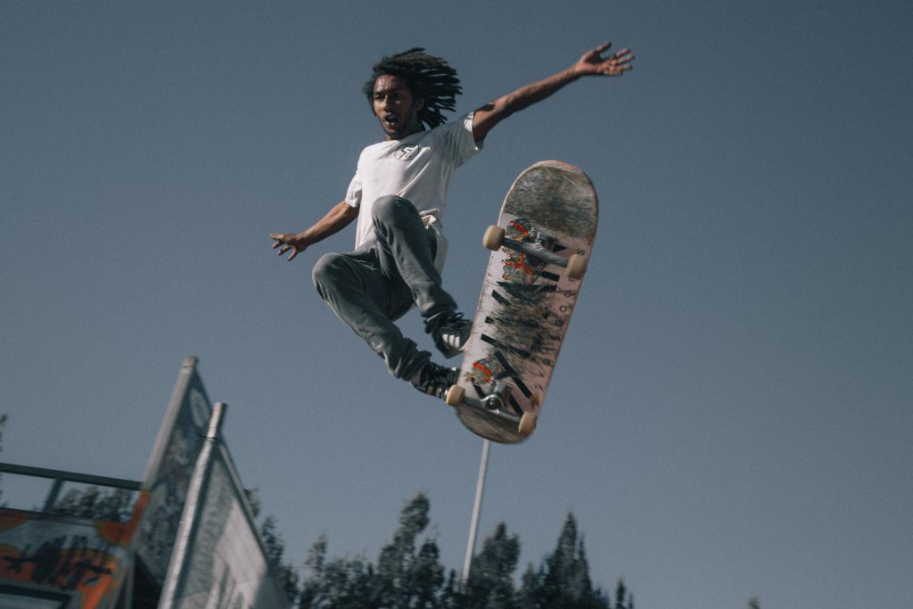 Man-flying-high-on-surf-skates